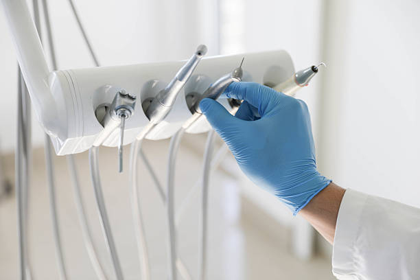 Professional Tooth Extraction technician working in Fairfax, CA